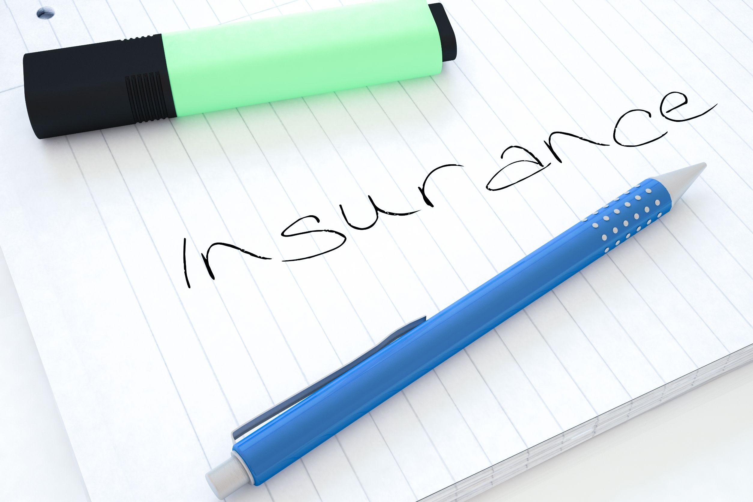 handwritten marketing insurance concept written on notebook under pend and highlighter